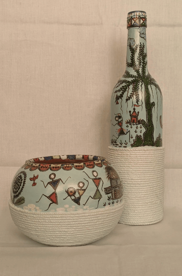 Warli painting on a. set of Glass bottle and terracotta pot - Leena Phuria